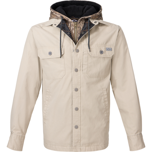 Drake Campfire Canvas Shirt Jac Hoodie with snap-and-zip front, camo-patterned hood, button-flap chest pockets, and side hand-warmer pockets, offers a versatile, utilitarian style.