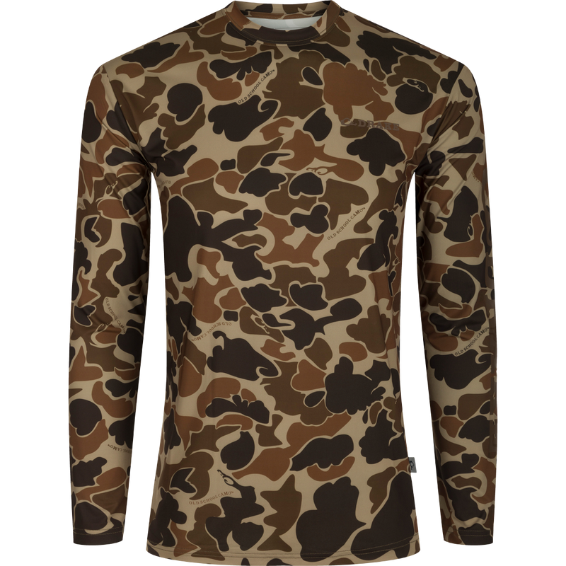 Drake Long Sleeve Performance Crew, showcasing lightweight, breathable fabric with built-in cooling and UPF 50 protection, ideal for outdoor activities like hunting and fishing.
