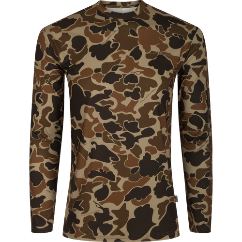 Drake Long Sleeve Performance Crew, showcasing lightweight, breathable fabric with built-in cooling and UPF 50 protection, ideal for outdoor activities like hunting and fishing.