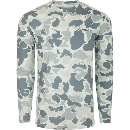 Drake Long Sleeve Performance Crew with built-in cooling, UPF 50, and quick-dry features, ideal for year-round wear in various outdoor activities.