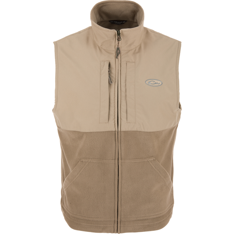 Eqwader Vest featuring a fleece-lined upper, waterproof shoulders, and breathable fleece lower. Includes Magnattach™ and zippered chest pockets for secure storage.