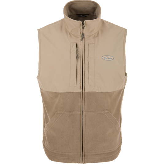 Eqwader Vest featuring a fleece-lined upper, waterproof shoulders, and breathable fleece lower. Includes Magnattach™ and zippered chest pockets for secure storage.