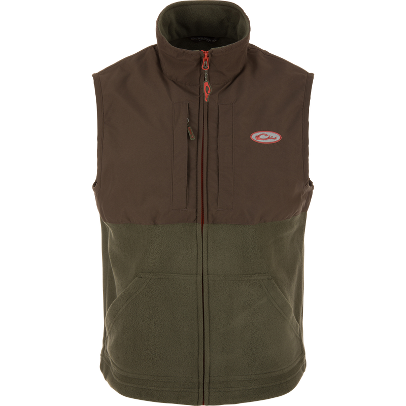 Eqwader Vest showcasing a close-up of its design, featuring waterproof shoulders, breathable fleece lower torso, and convenient chest pockets for secure storage.