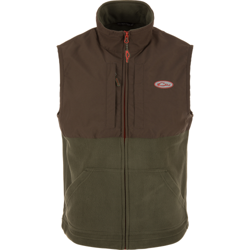Eqwader Vest showcasing a close-up of its design, featuring waterproof shoulders, breathable fleece lower torso, and convenient chest pockets for secure storage.