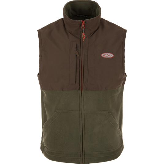Eqwader Vest showcasing a close-up of its design, featuring waterproof shoulders, breathable fleece lower torso, and convenient chest pockets for secure storage.