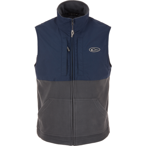 Eqwader Vest featuring mid-layer insulation and waterproof shoulders, with Magnattach™ and zippered chest pockets, designed for optimal movement and breathability in hunting environments.