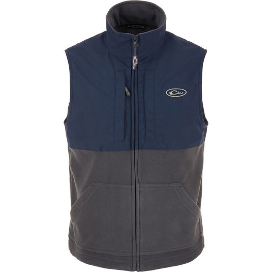 Eqwader Vest featuring mid-layer insulation and waterproof shoulders, with Magnattach™ and zippered chest pockets, designed for optimal movement and breathability in hunting environments.
