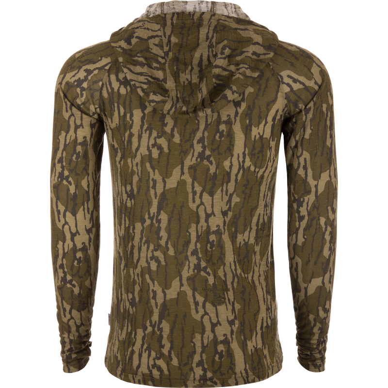 Hunter Creek Bamboo Long Sleeve Hoodie in camouflage pattern, displayed from the back on a mannequin, showcasing its lightweight, breathable design ideal for versatile outdoor activities.