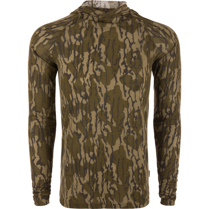 Hunter Creek Bamboo Long Sleeve Hoodie on mannequin, showcasing form-fitting design with woodland camo print, emphasizing lightweight, breathable fabric, and built-in hood for sun protection.