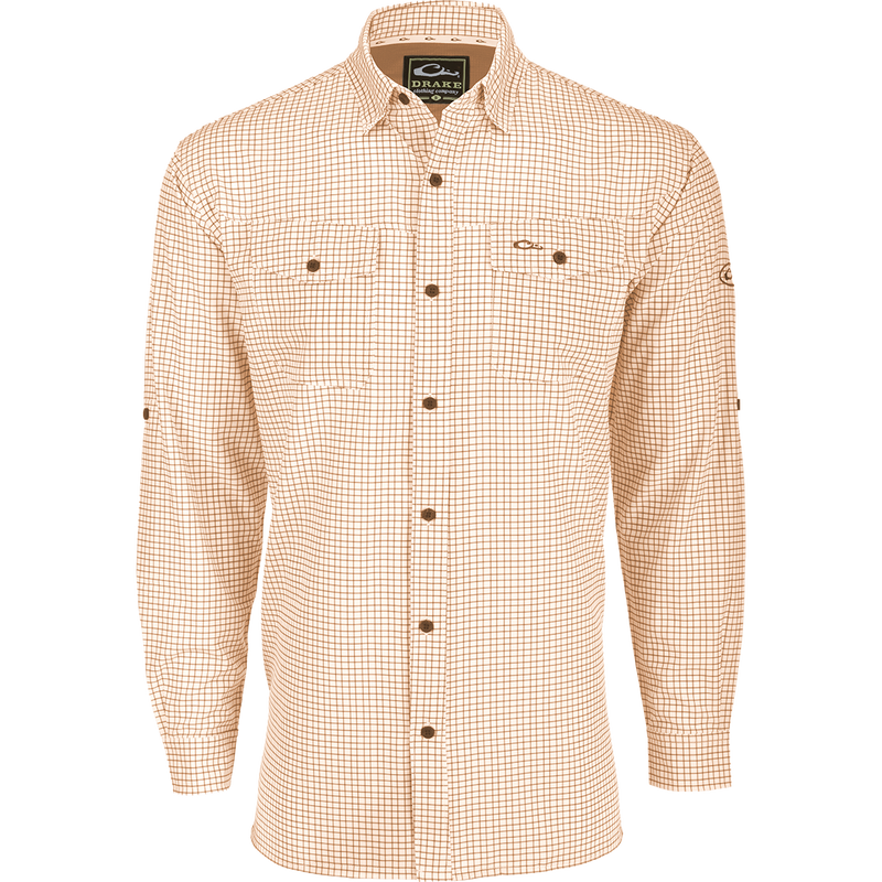 A lightweight, Four Way Stretch long sleeve shirt with a checkered pattern. Perfect for the man on the go, whether on vacation or running errands. Features include hidden button-down collar, adjustable roll-up sleeves, and two chest pockets. From Purewhitelaneshop.