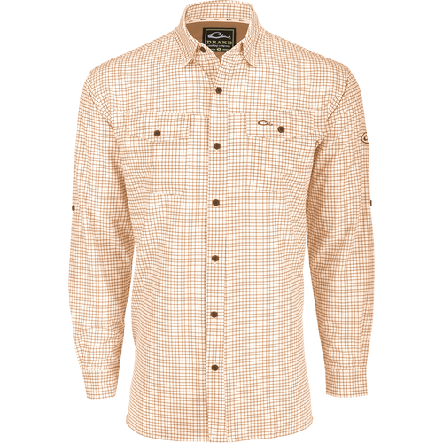 A lightweight, Four Way Stretch long sleeve shirt with a checkered pattern. Perfect for the man on the go, whether on vacation or running errands. Features include hidden button-down collar, adjustable roll-up sleeves, and two chest pockets. From Purewhitelaneshop.