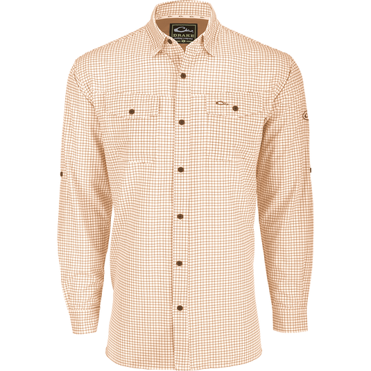 A lightweight, Four Way Stretch long sleeve shirt with a checkered pattern. Perfect for the man on the go, whether on vacation or running errands. Features include hidden button-down collar, adjustable roll-up sleeves, and two chest pockets. From Purewhitelaneshop.