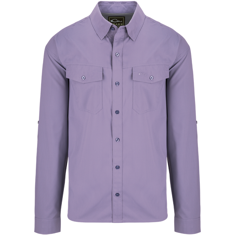 Traveler's Solid Dobby Button-Down Long Sleeve Shirt with hidden button-down collar, two chest pockets, and adjustable roll-up sleeves.