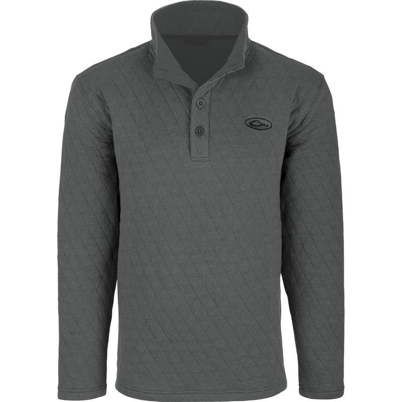 A grey long sleeved Delta Quilted Sweatshirt with button front, perfect for active outdoorsmen in cooler weather. Polyester fleece lining and cotton shell fabric provide warmth and comfort. Ideal for checking trail cams, setting up food plots, and other cool day activities.