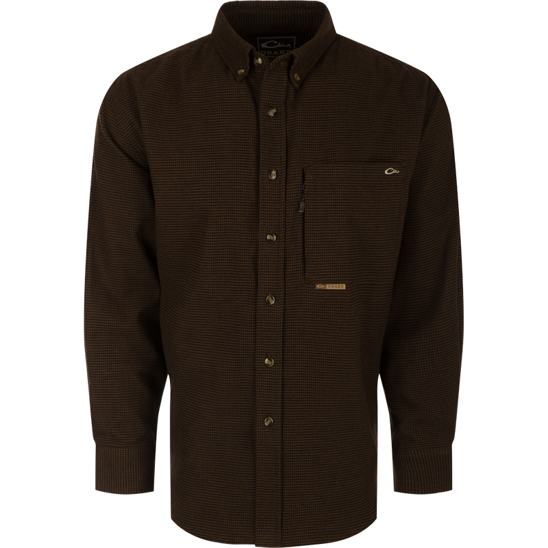 A midweight, long-sleeved houndstooth shirt made from 100% brushed cotton twill. Features a button-down collar, back box pleat, and chest pockets. Perfect for cool weather.