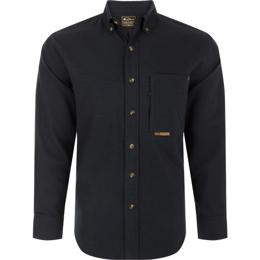 A black long-sleeved shirt with button-down collar, chest pockets, and houndstooth pattern. Perfect for cool weather.