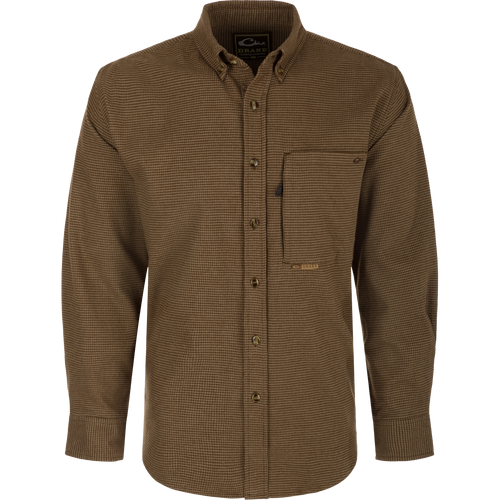 A midweight, long-sleeved shirt crafted from 100% brushed cotton twill. Features a button-down collar, back box pleat, and chest pockets. Perfect for cool weather.