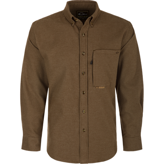 A midweight, long-sleeved shirt crafted from 100% brushed cotton twill. Features a button-down collar, back box pleat, and chest pockets. Perfect for cool weather.