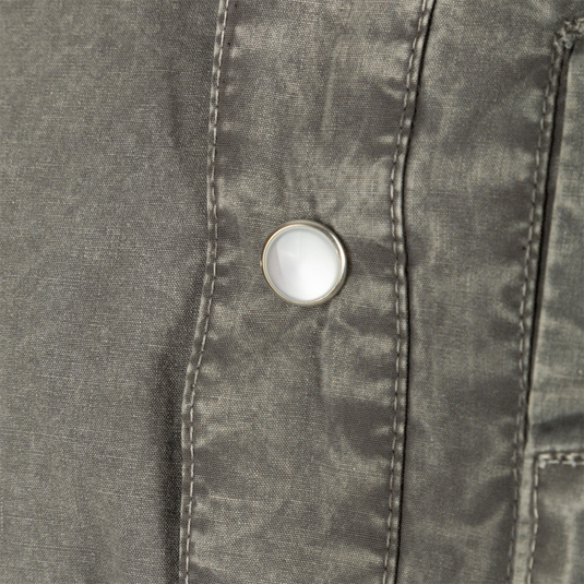 Close-up of the Cinco Ranch Western Acid Washed Cotton Shirt, highlighting a faux pearl snap and detailed stitching on the fabric, emphasizing Western design features.