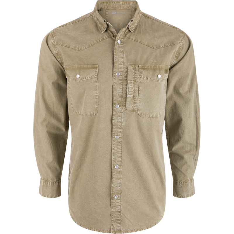 Cinco Ranch Western Solid Acid Wash Long Sleeve Shirt features a Western yoke, snap-front, chest pockets, roll-up sleeves, and scalloped hem, ideal for versatile wear.