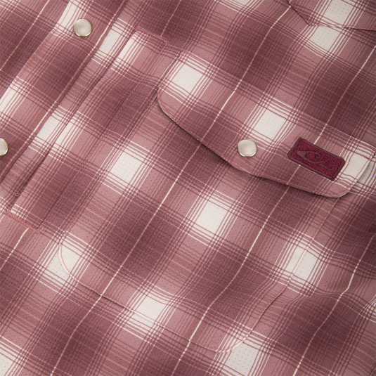 Close-up of the Drake Cinco Ranch Western Plaid Long Sleeve Shirt, highlighting its faux pearl snap button and plaid micro-mesh fabric designed for performance and comfort.