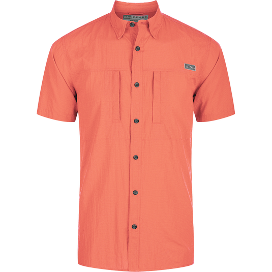 Close-up of the Drake Classic Seersucker Minicheck Button-Down Short Sleeve Shirt showcasing its button detail and seersucker texture for performance and style.