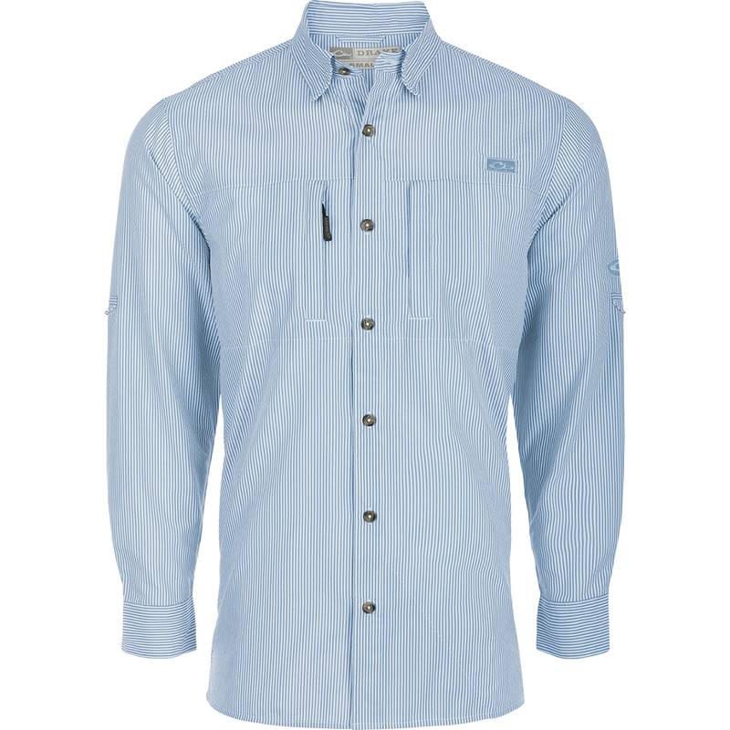 A classic seersucker stripe shirt with a button-down collar, hidden zippered chest pocket, and Magnattach™ closure. Made from performance fabric for moisture-wicking and UPF30 sun protection. Vented cape back and split tail hem for ventilation and versatility. Perfect for hunting, fishing, and casual wear.