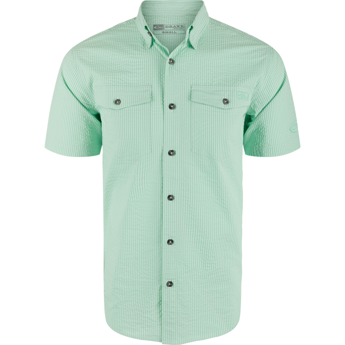 Frat Seersucker Striped Button-Down Short Sleeve Shirt on mannequin, featuring button-down collar, two flap chest pockets, dark buttons, vented cape back, and sculpted hem.