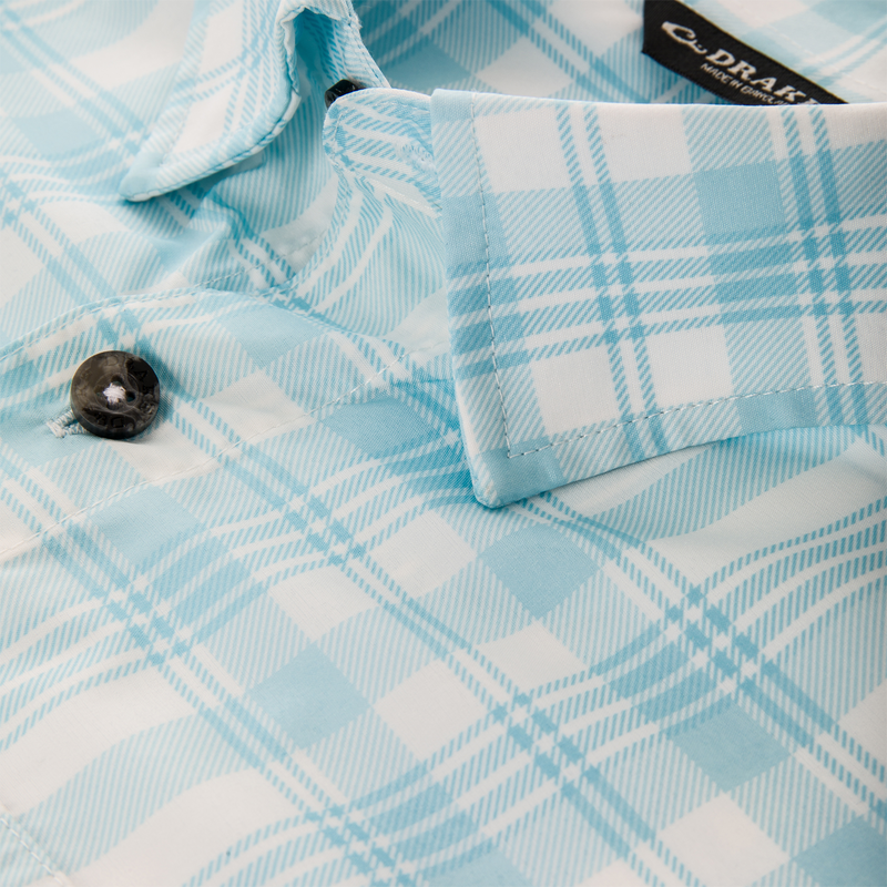 Frat Faded Plaid Button-Down Short Sleeve Shirt with button detail, showcasing lightweight fabric ideal for an active lifestyle, featuring hidden button collar and vented cape back.