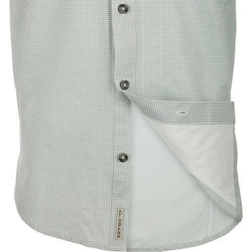 Closeup of Frat Houndstooth Check Short Sleeve Shirt with hidden collar, chest pockets, and vented back for outdoor adventures.
