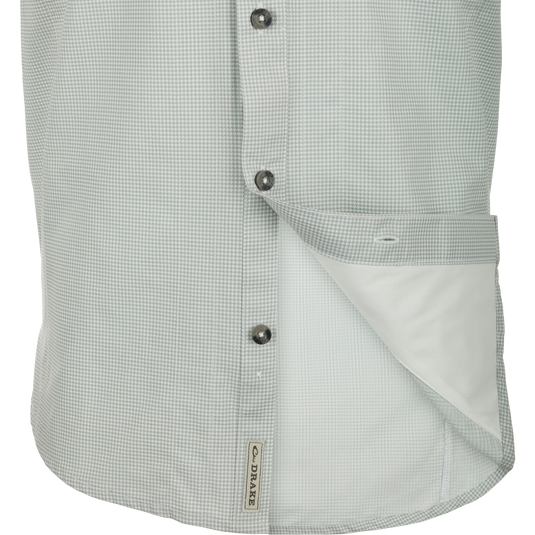 Closeup of Frat Houndstooth Check Short Sleeve Shirt with hidden collar, chest pockets, and vented back for outdoor adventures.
