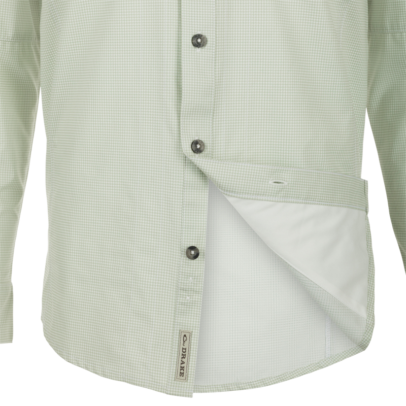 A Purewhitelaneshop Frat Houndstooth Check Button-Down Shirt with hidden collar, chest pockets, and vented back. Features include UPF30, moisture-wicking fabric, and sculpted hem for versatile wear.