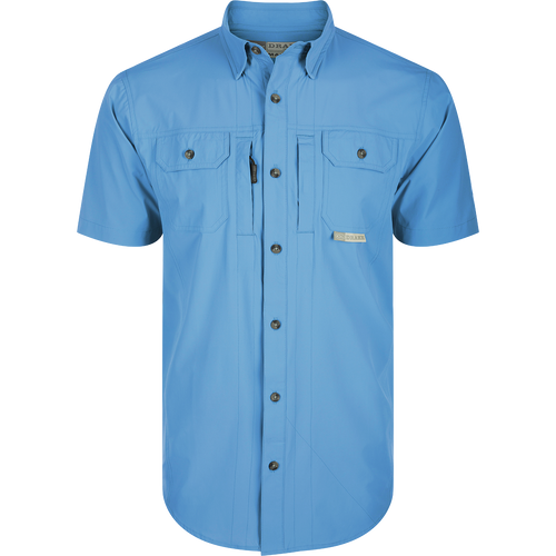 Wingshooter Trey Shirt S/S with hidden collar, vented back, and functional pockets, made of performance fabric for outdoor activities: Marina Blue