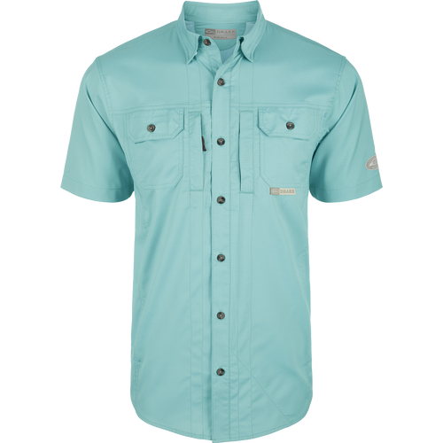 Aqua Haze Wingshooter Trey Solid Dobby Shirt S/S: Lightweight performance shirt with hidden collar, vented back, and unique pocket system.