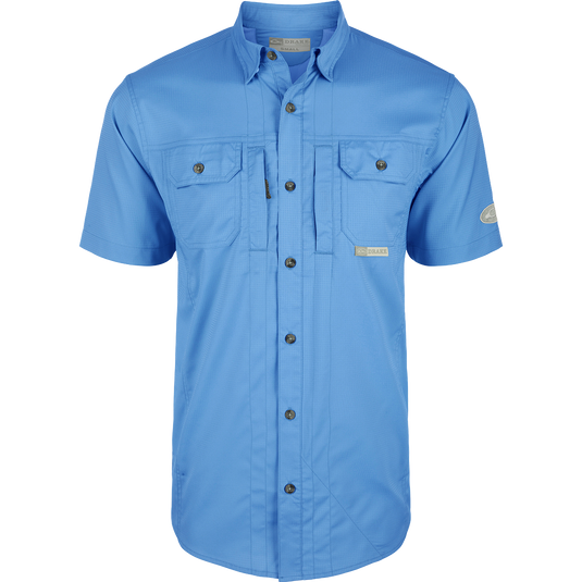 Marina Blue Wingshooter Trey Solid Dobby Shirt S/S, a performance shirt with hidden collar, vented back, and unique pocket system for outdoor activities.