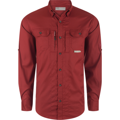 Close-up of the Wingshooter's Trey Dobby Button-Down Long Sleeve Shirt, highlighting its textured fabric, hidden button-down collar, and vented back, suitable for performance and casual wear.