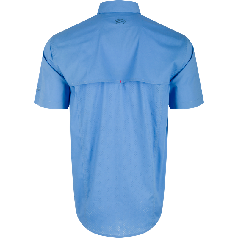 Wingshooter Trey Solid Short Sleeve Shirt with vented cape back, button-through flap chest pockets, and sculpted hem, ideal for comfort and mobility in active settings.