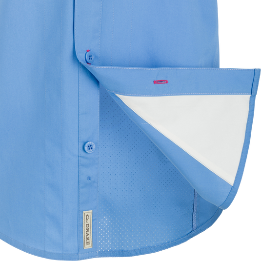 Close-up of the Wingshooter Trey Solid Short Sleeve Shirt, highlighting its button detail and soft cotton blend fabric with vented cape back.