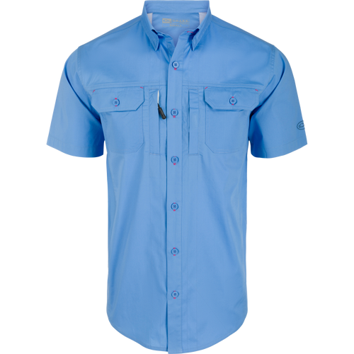 Wingshooter Trey Solid Short Sleeve Shirt featuring a button-down collar, vented back, and chest pockets, designed for comfort and ease of movement.