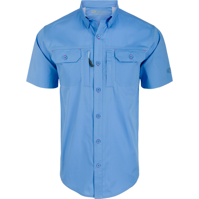 Wingshooter Trey Solid Short Sleeve Shirt featuring a button-down collar, vented back, and chest pockets, designed for comfort and ease of movement.