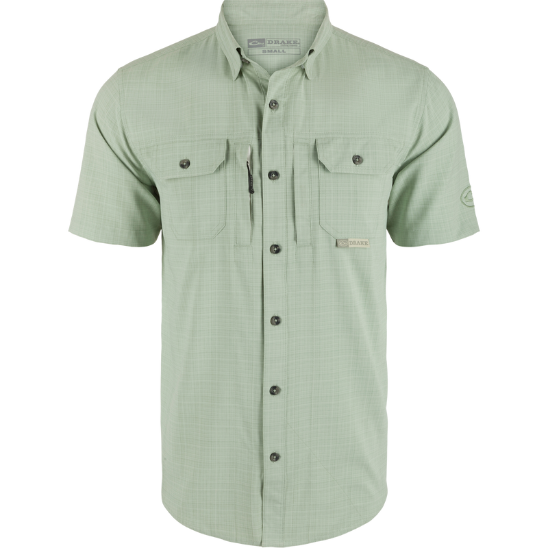 Wingshooter Trey Cross Hatch Short Sleeve Shirt featuring a hidden button-down collar, vented back, and functional chest pockets, designed for performance and comfort.