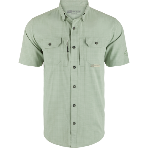 Wingshooter Trey Cross Hatch Short Sleeve Shirt featuring a hidden button-down collar, vented back, and functional chest pockets, designed for performance and comfort.