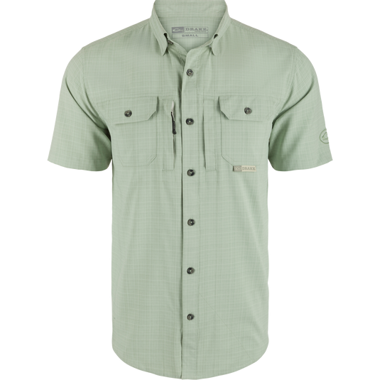 Wingshooter Trey Cross Hatch Short Sleeve Shirt featuring a hidden button-down collar, vented back, and functional chest pockets, designed for performance and comfort.