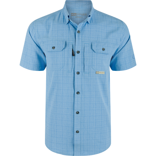Wingshooter Trey Cross Hatch Short Sleeve Shirt featuring a button-down collar, vented cape back, and two flap chest pockets, designed with moisture-wicking polyester fabric.