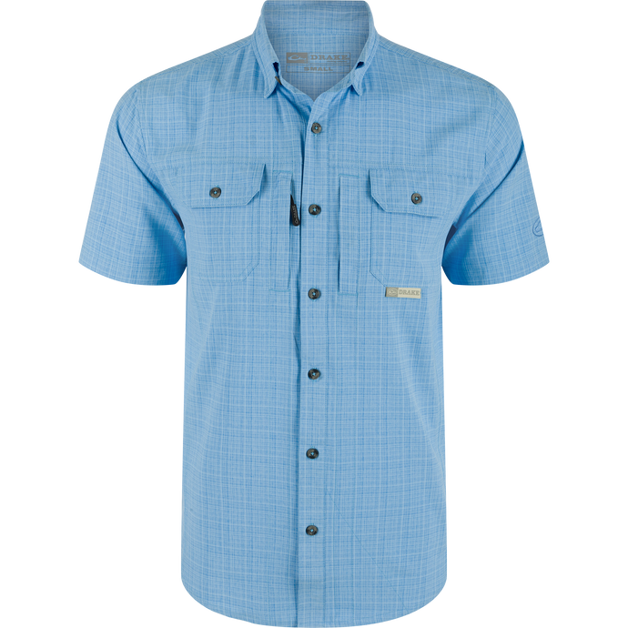 Wingshooter Trey Cross Hatch Short Sleeve Shirt featuring a button-down collar, vented cape back, and two flap chest pockets, designed with moisture-wicking polyester fabric.