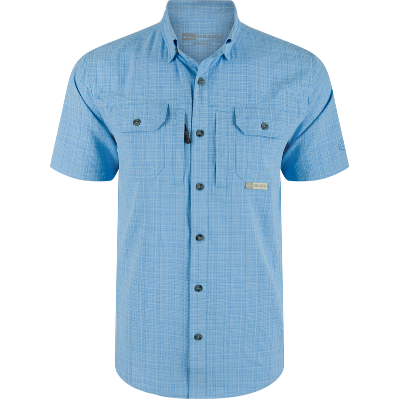 Wingshooter Trey Cross Hatch Short Sleeve Shirt featuring a button-down collar, vented cape back, and two flap chest pockets, designed with moisture-wicking polyester fabric.