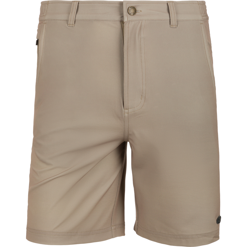 Grayson Creek Short featuring a traditional silhouette, close-up on button detailing and stitching, showcasing side elastic waistband and secure zippered pocket for versatile outdoor adventures.