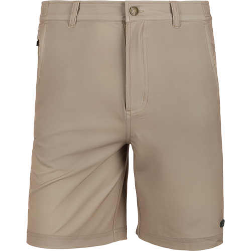 Grayson Creek Short featuring a traditional silhouette, close-up on button detailing and stitching, showcasing side elastic waistband and secure zippered pocket for versatile outdoor adventures.