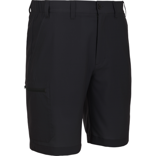 Traveler Trek Short in black, featuring a zip fly, elastic waist, belt loops, side pockets, and a zippered cargo pocket, ideal for active and outdoor pursuits.