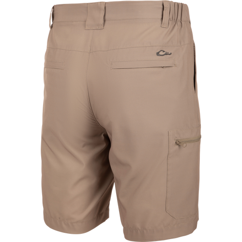 Backside of Traveler Trek Short with built-in stretch, moisture-wicking fabric, YKK zippered pockets, and 8.5 inseam. Ideal for adventures.